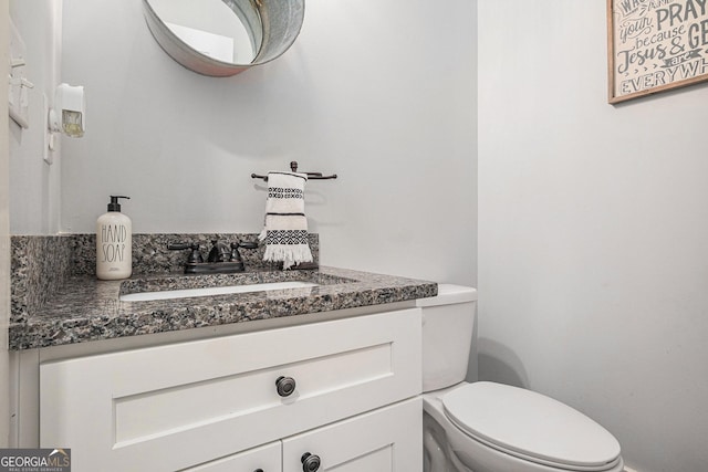 2129 Apalachee Trl, Monroe, GA 30656 - half bathroom featuring toilet and vanity