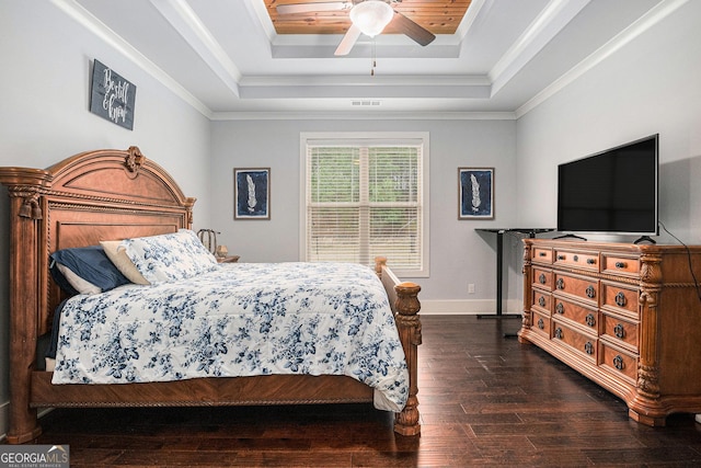 2129 Apalachee Trl, Monroe, GA 30656 - bedroom featuring a tray ceiling, hardwood / wood-style floors, baseboards, ornamental molding, and a ceiling fan