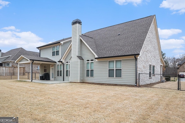 2129 Apalachee Trl, Monroe, GA 30656 - rear view of property with a patio, a shingled roof, and a chimney