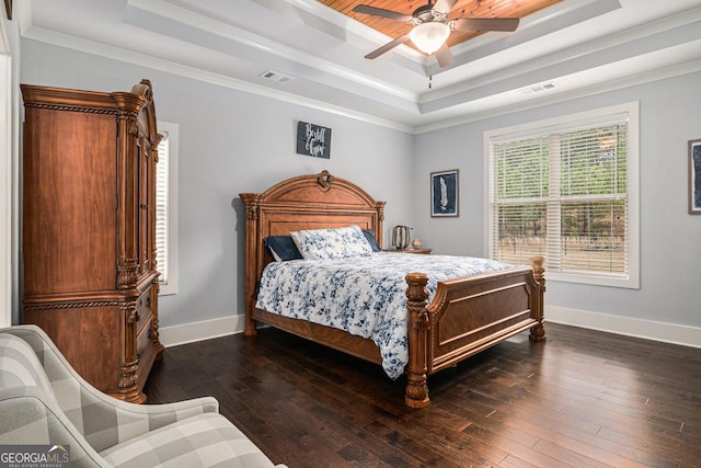 2129 Apalachee Trl, Monroe, GA 30656 - bedroom with a tray ceiling, dark wood-style floors, baseboards, and ceiling fan