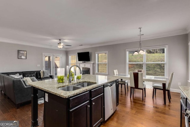 3475 Summerlin Pkwy, Lithia Springs, GA 30122 - kitchen with dishwasher, light wood-style flooring, a sink, and open floor plan