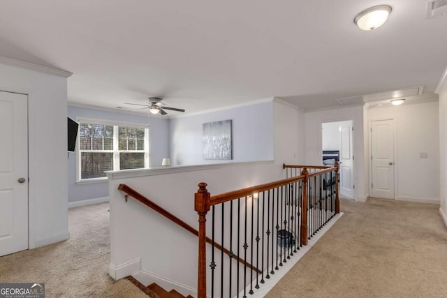 3475 Summerlin Pkwy, Lithia Springs, GA 30122 - corridor with carpet floors, an upstairs landing, attic access, and ornamental molding
