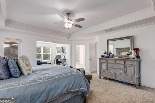 3475 Summerlin Pkwy, Lithia Springs, GA 30122 - bedroom with ornamental molding, light carpet, a tray ceiling, and visible vents