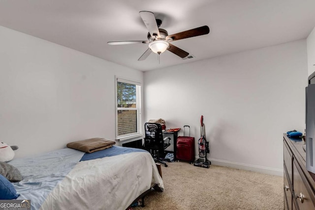 3475 Summerlin Pkwy, Lithia Springs, GA 30122 - bedroom with baseboards, visible vents, ceiling fan, and carpet floors