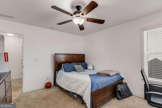 3475 Summerlin Pkwy, Lithia Springs, GA 30122 - bedroom featuring ceiling fan, baseboards, light colored carpet, and visible vents