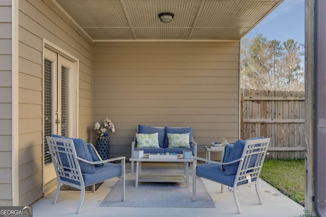 3475 Summerlin Pkwy, Lithia Springs, GA 30122 - view of patio with an outdoor living space and fence