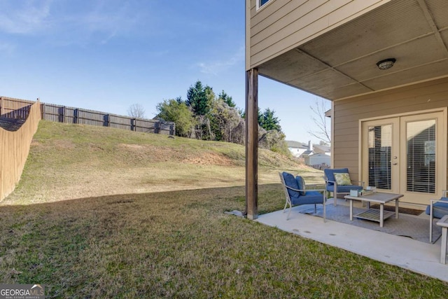 3475 Summerlin Pkwy, Lithia Springs, GA 30122 - view of yard with a fenced backyard, a patio area, and french doors
