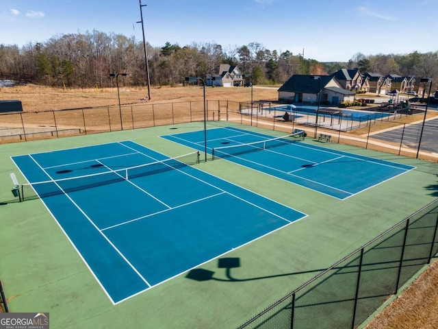3475 Summerlin Pkwy, Lithia Springs, GA 30122 - view of sport court with community basketball court and fence
