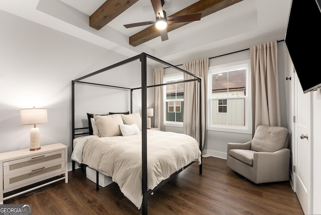 bedroom with dark wood-style flooring, beamed ceiling, baseboards, and a ceiling fan