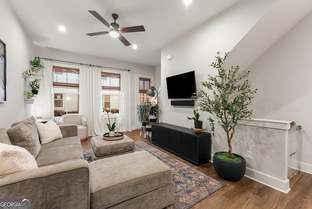 living area with recessed lighting, baseboards, a ceiling fan, and wood finished floors