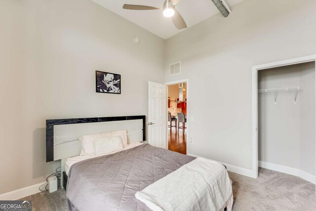 3820 Roswell Rd NE Unit 902, Atlanta, GA 30342 - carpeted bedroom featuring baseboards, visible vents, a closet, and a ceiling fan