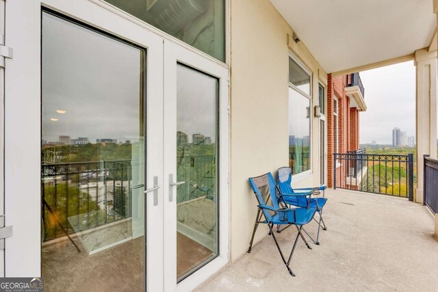 3820 Roswell Rd NE Unit 902, Atlanta, GA 30342 - balcony featuring a city view