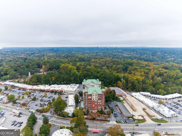 3820 Roswell Rd NE Unit 902, Atlanta, GA 30342 - drone / aerial view featuring a wooded view