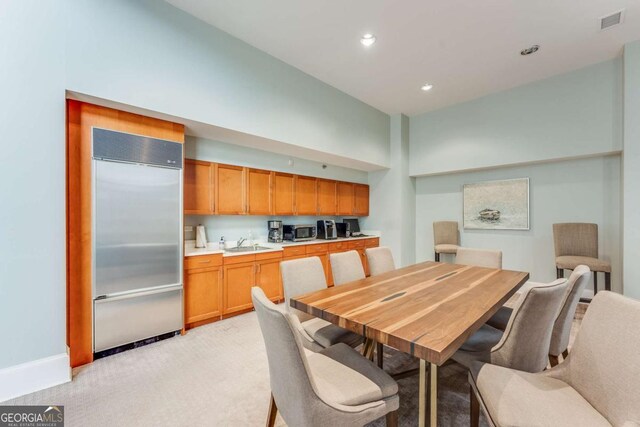 3820 Roswell Rd NE Unit 902, Atlanta, GA 30342 - dining room featuring light colored carpet, visible vents, baseboards, and recessed lighting