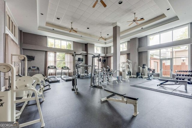 3820 Roswell Rd NE Unit 902, Atlanta, GA 30342 - workout area featuring ceiling fan and a raised ceiling