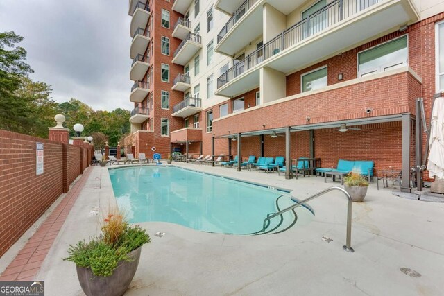 3820 Roswell Rd NE Unit 902, Atlanta, GA 30342 - pool with a patio