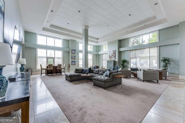 3820 Roswell Rd NE Unit 902, Atlanta, GA 30342 - living area with a high ceiling, tile patterned floors, and a raised ceiling