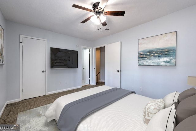 carpeted bedroom with baseboards, ceiling fan, and visible vents