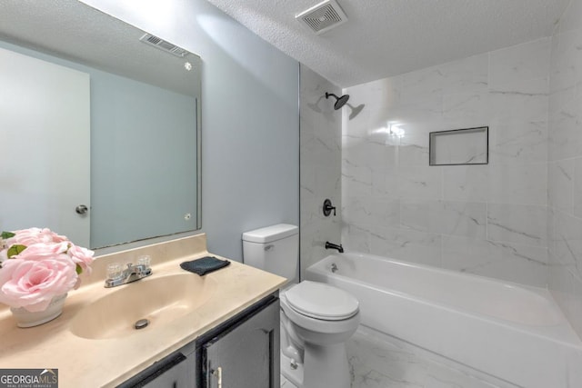 bathroom featuring a textured ceiling, visible vents, marble finish floor, toilet, and vanity
