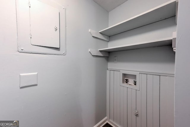 washroom with washer hookup, laundry area, and electric panel