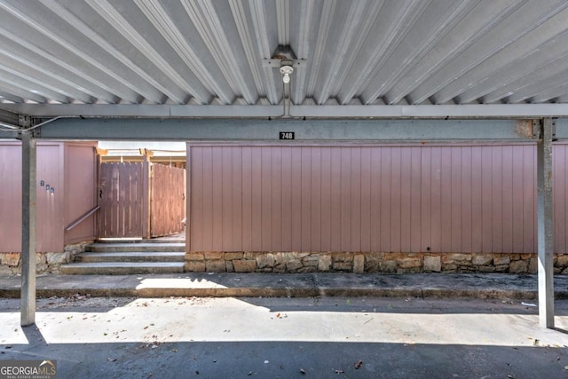 view of property exterior with fence