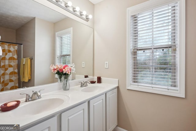 810 Abbotts Mill Ct Unit 83, Duluth, GA 30097 - bathroom featuring double vanity and a sink