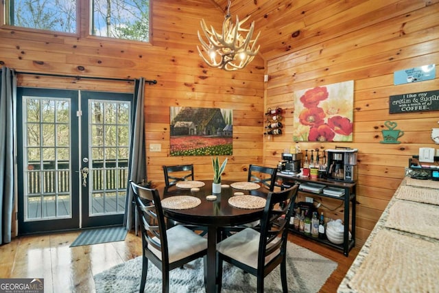 27 Alpine Dr Unit 3625, Ellijay, GA 30540 - dining area featuring french doors, a chandelier, hardwood / wood-style floors, and wood walls