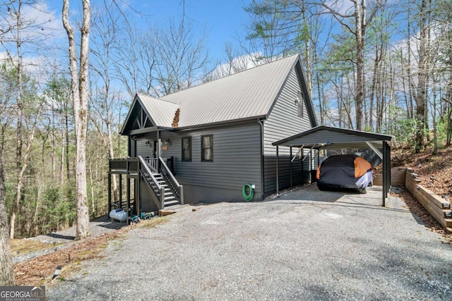 27 Alpine Dr Unit 3625, Ellijay, GA 30540 - view of front of house with gravel driveway, a detached carport, stairs, and a metal roof