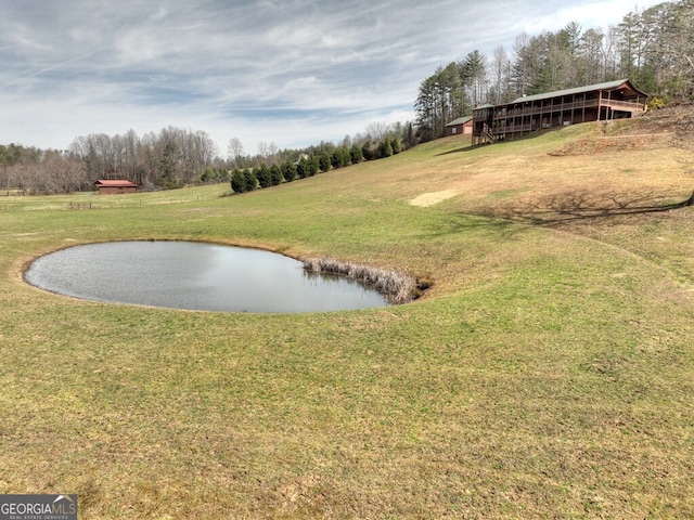 view of yard with a water view