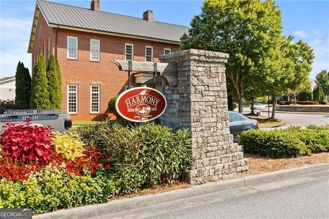 view of community sign