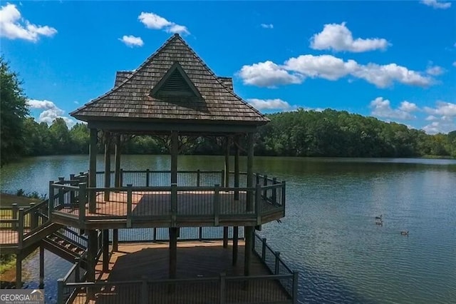dock area with a water view and a gazebo
