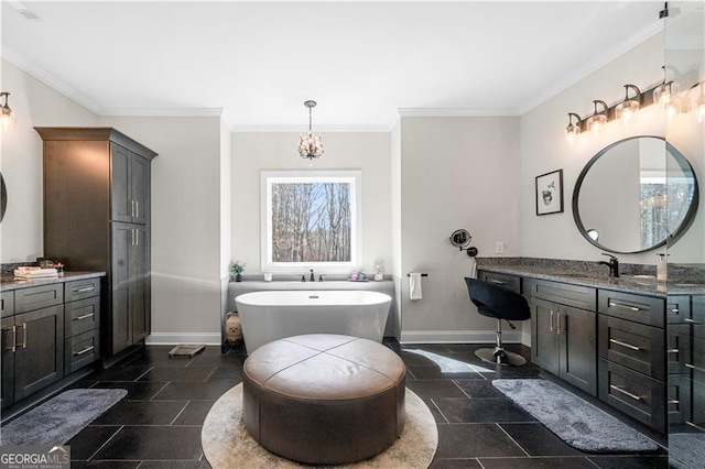 full bathroom with a soaking tub, vanity, crown molding, and baseboards