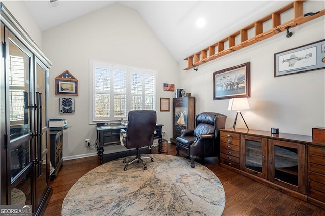 office space featuring high vaulted ceiling, baseboards, and dark wood-style floors