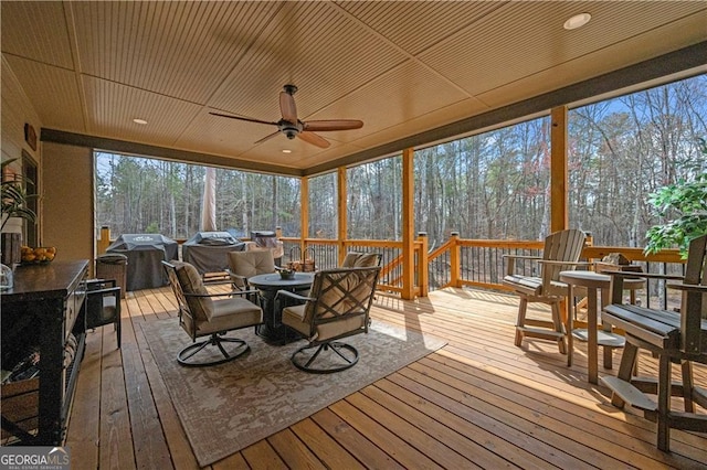 sunroom / solarium with a wealth of natural light