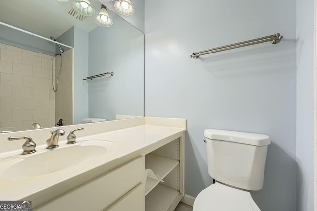 full bath with visible vents, walk in shower, toilet, and vanity