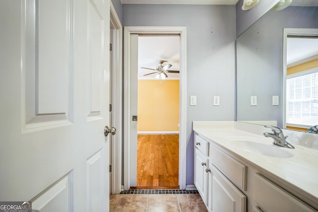 bathroom featuring a ceiling fan, tile patterned flooring, and vanity