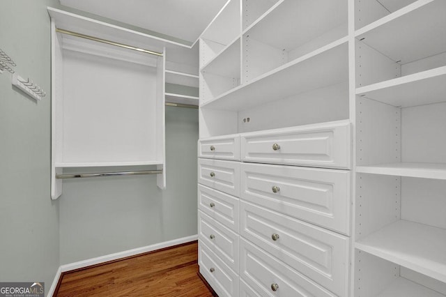 7037 Waters Edge Dr, Stone Mountain, GA 30087 - spacious closet featuring wood finished floors