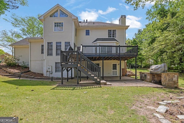 7037 Waters Edge Dr, Stone Mountain, GA 30087 - rear view of house with a wooden deck, stairway, and a yard
