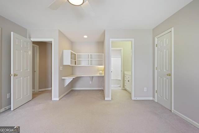 unfurnished bedroom featuring baseboards, light carpet, recessed lighting, a ceiling fan, and connected bathroom