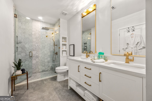 full bathroom with toilet, a sink, and a shower stall