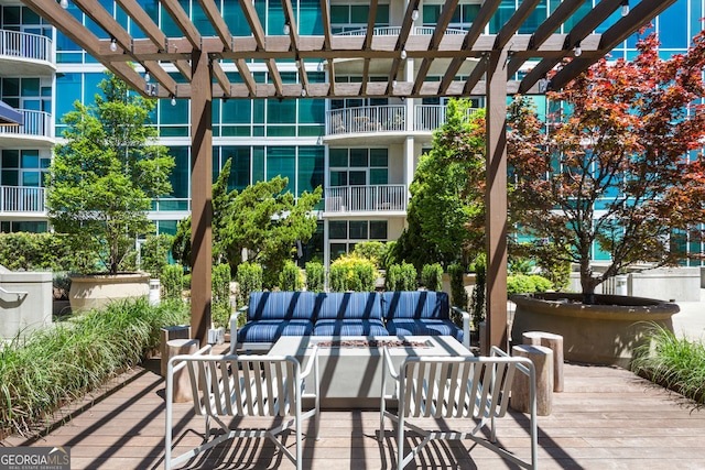 view of patio with an outdoor hangout area and a pergola