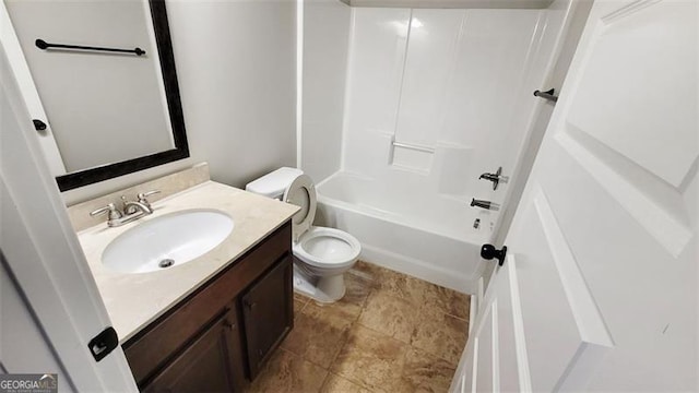 bathroom with vanity, toilet, and bathing tub / shower combination