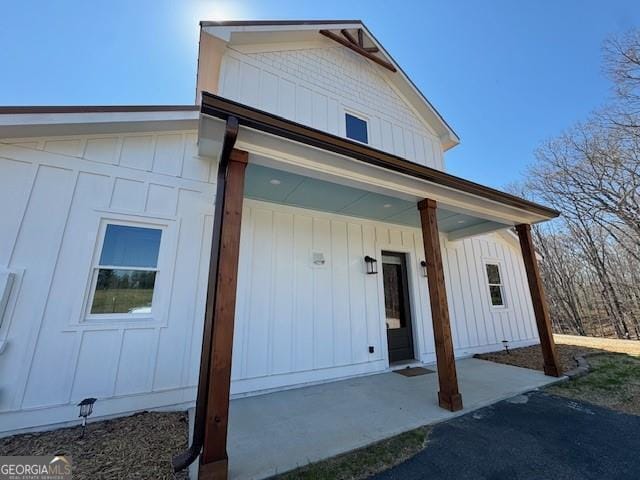 1759 Moccasin Gap Rd, Lula, GA 30554 - entrance to property with a porch and board and batten siding