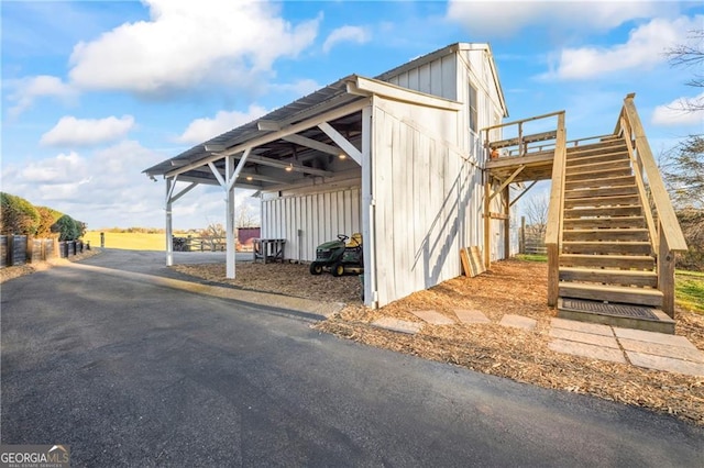 1759 Moccasin Gap Rd, Lula, GA 30554 - view of car parking featuring stairway, driveway, and a carport