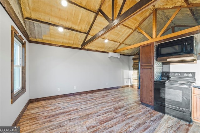 1759 Moccasin Gap Rd, Lula, GA 30554 - kitchen featuring black appliances, a wall unit AC, wood finished floors, wood ceiling, and lofted ceiling