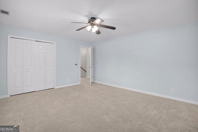 548 Sand Hill Rd, Brooklet, GA 30415 - unfurnished bedroom with baseboards, visible vents, a closet, and carpet