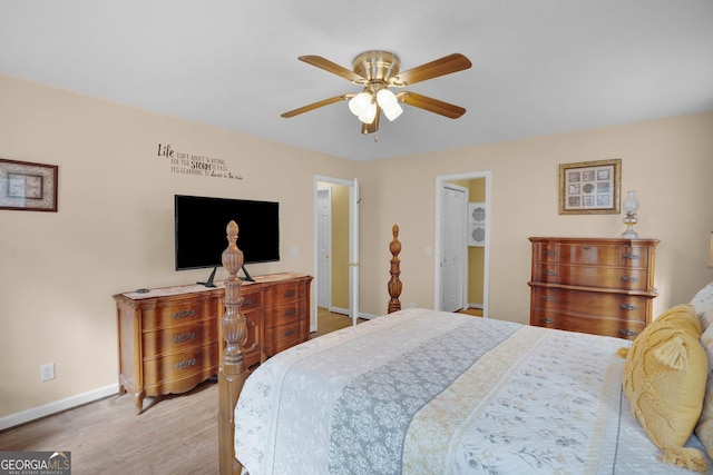 548 Sand Hill Rd, Brooklet, GA 30415 - bedroom with baseboards, ceiling fan, and wood finished floors