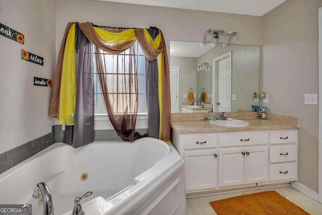 104 Sugar Maple Way, Kingsland, GA 31548 - bathroom featuring vanity and a jetted tub