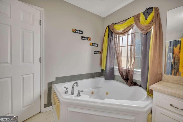 104 Sugar Maple Way, Kingsland, GA 31548 - bathroom featuring a jetted tub and tile patterned floors