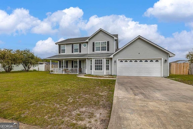 104 Sugar Maple Way, Kingsland, GA 31548 - view of front facade with covered porch, concrete driveway, and a garage